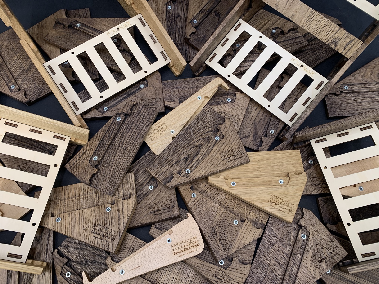 MONOSHAPE wooden stand components in the workshop
